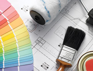 Paintbrush, colour charts, plans and roller